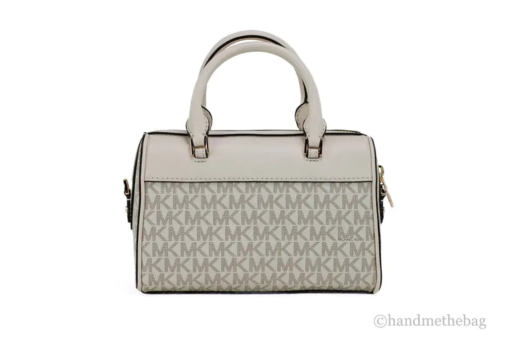 Michael Kors Travel XS Light Cream Signature PVC Duffle Crossbody Handbag