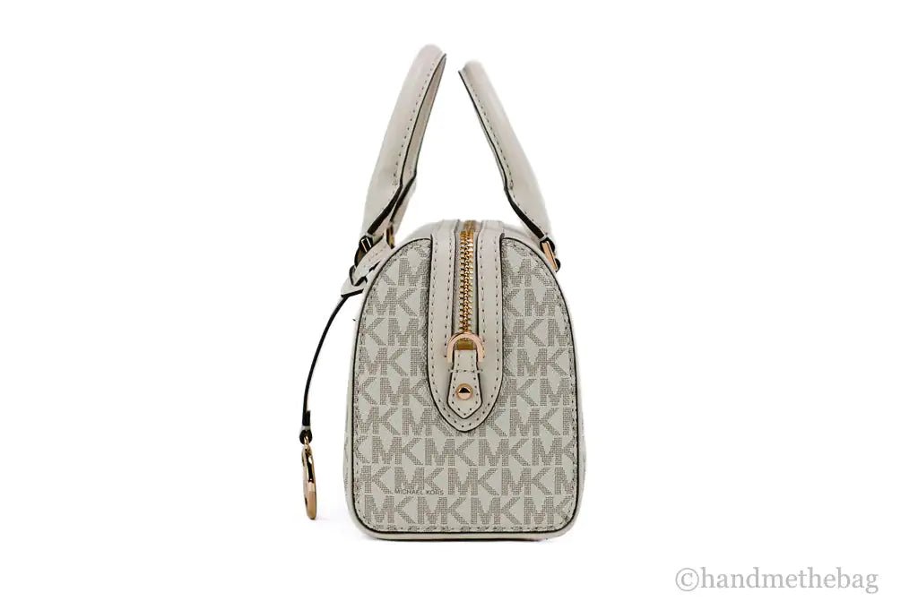 Michael Kors Travel XS Light Cream Signature PVC Duffle Crossbody Handbag